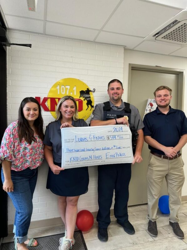 Enid Police Department and Loaves and Fishes Talk Money Raised by Guns N Hoses Charity Softball Game