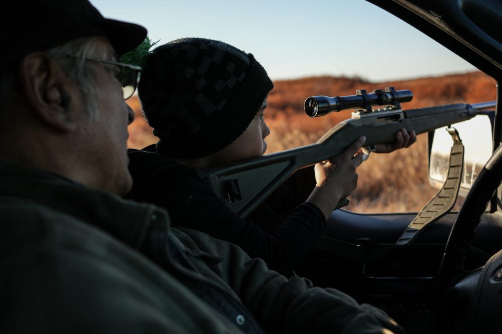 In Alaska’s warming Arctic, photos show an Indigenous elder passing down hunting traditions