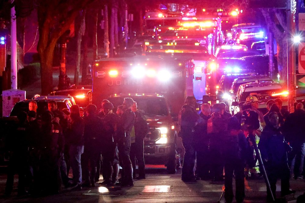 Photos show police investigation of a shooting at Brown University.