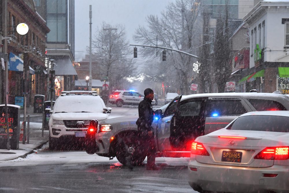 The Latest: A person is in custody after deadly Brown University shooting leaves 2 dead, 9 wounded