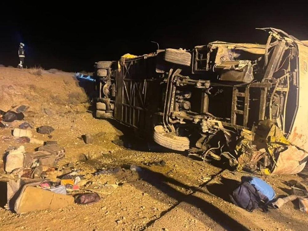 Bus crash kills 13 and injures over a dozen on highway in central Iran