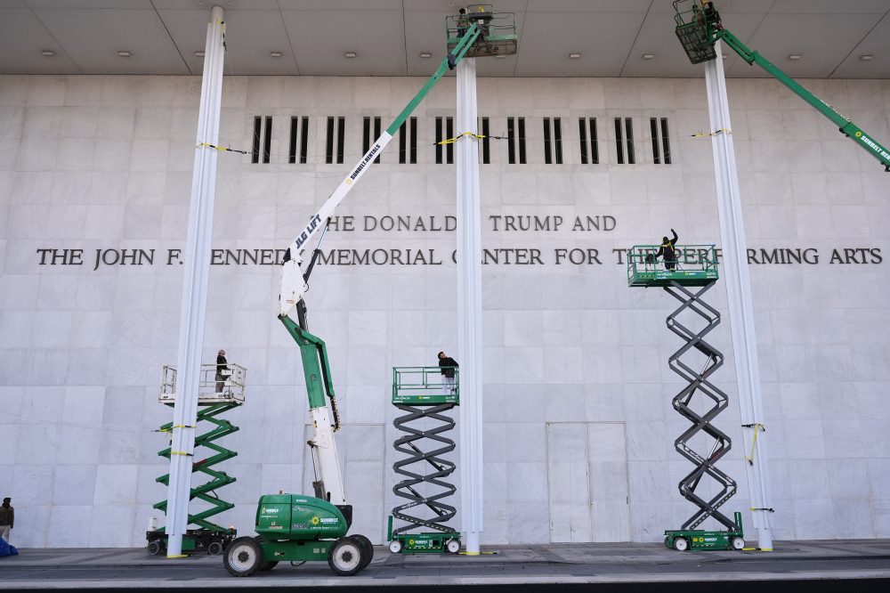 Photos of Trump’s name being added to the Kennedy Center