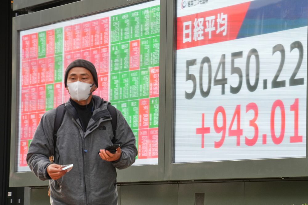 Asian shares advance, yen slips after AI stocks push higher on Wall Street