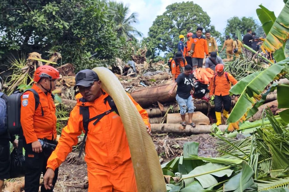 Flash floods in Indonesia kill at least 16 people and sweep away homes