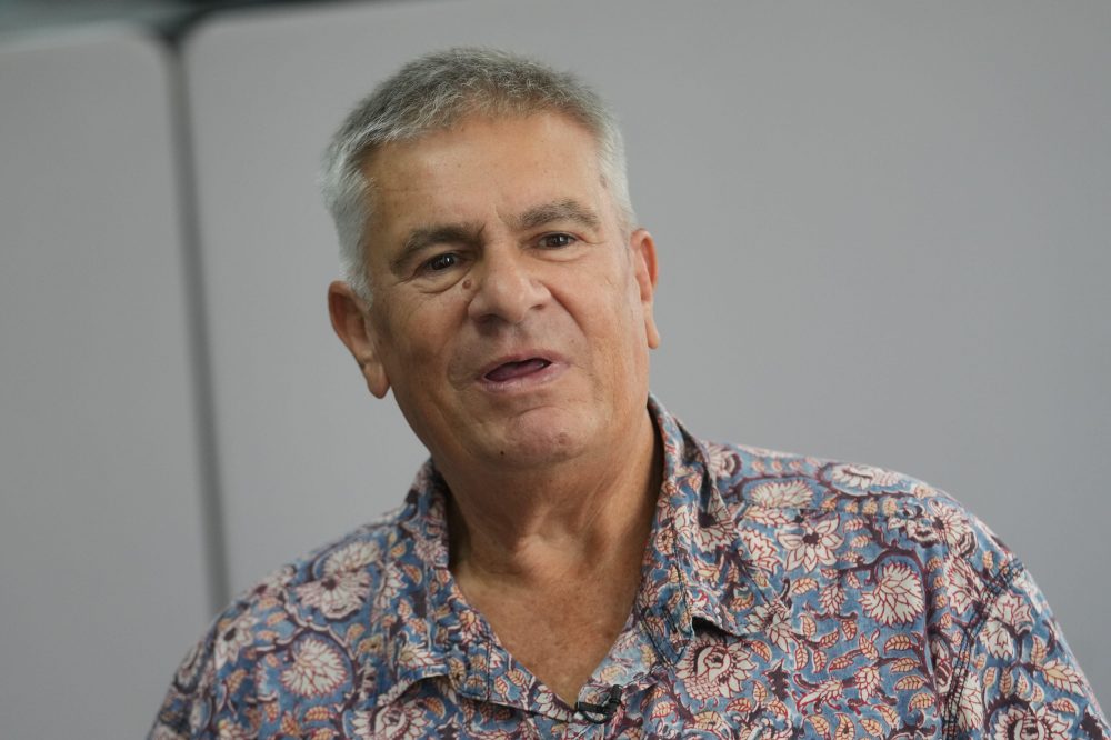 A writer is cleared by Thai court after Malaysian agency withdraws defamation case