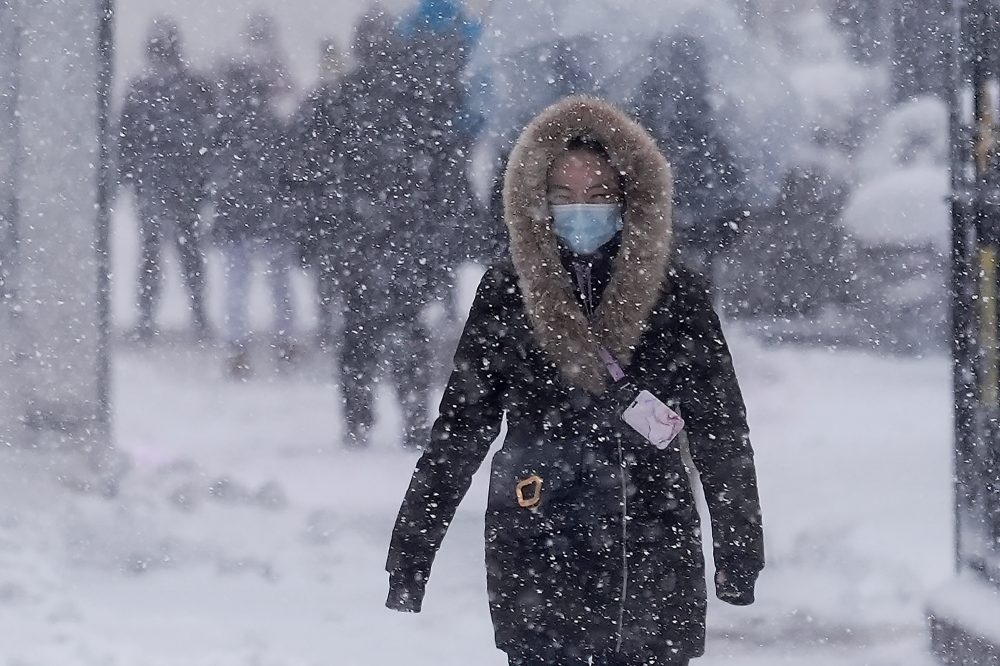 Northeast US digs out from brutal storm that disrupted flights and canceled school