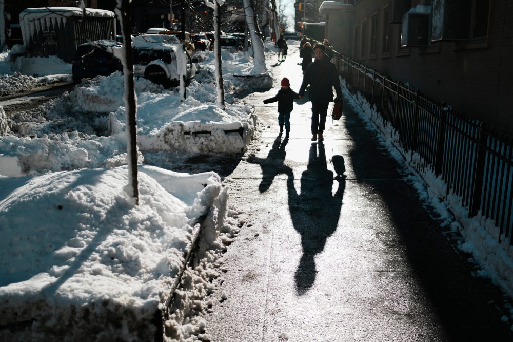 Northeast US scrambles to clear piles of snow as new storm descends on the region