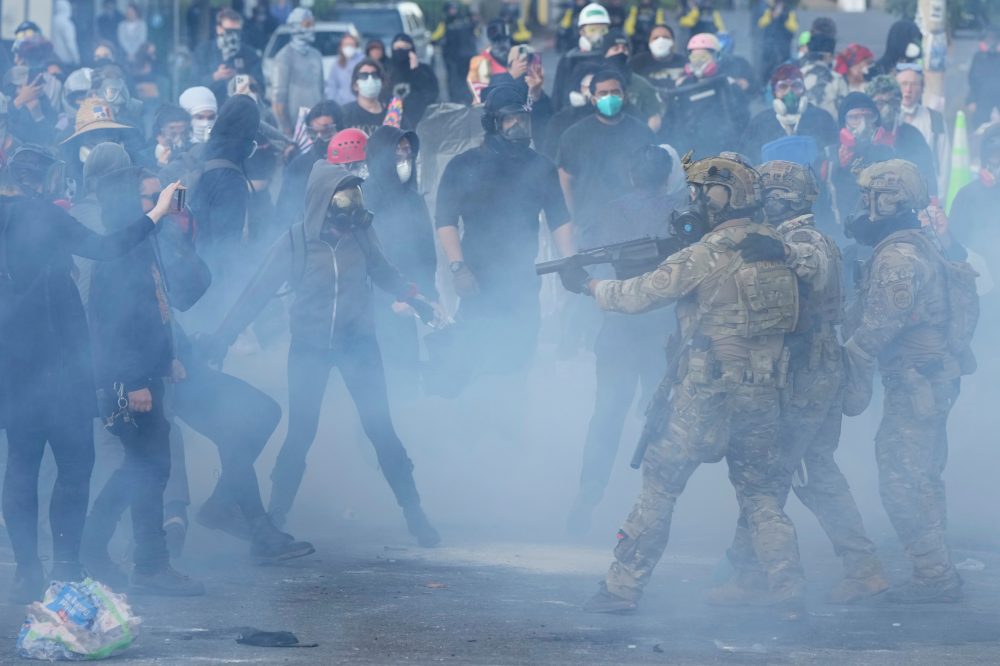 Judge in Oregon limits federal officers’ tear gas use at Portland ICE building protests