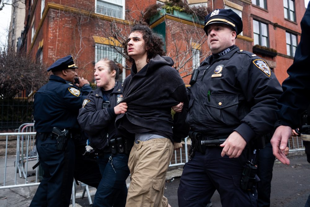FBI hunts for clues after 2 men charged with lighting bombs at NYC protest