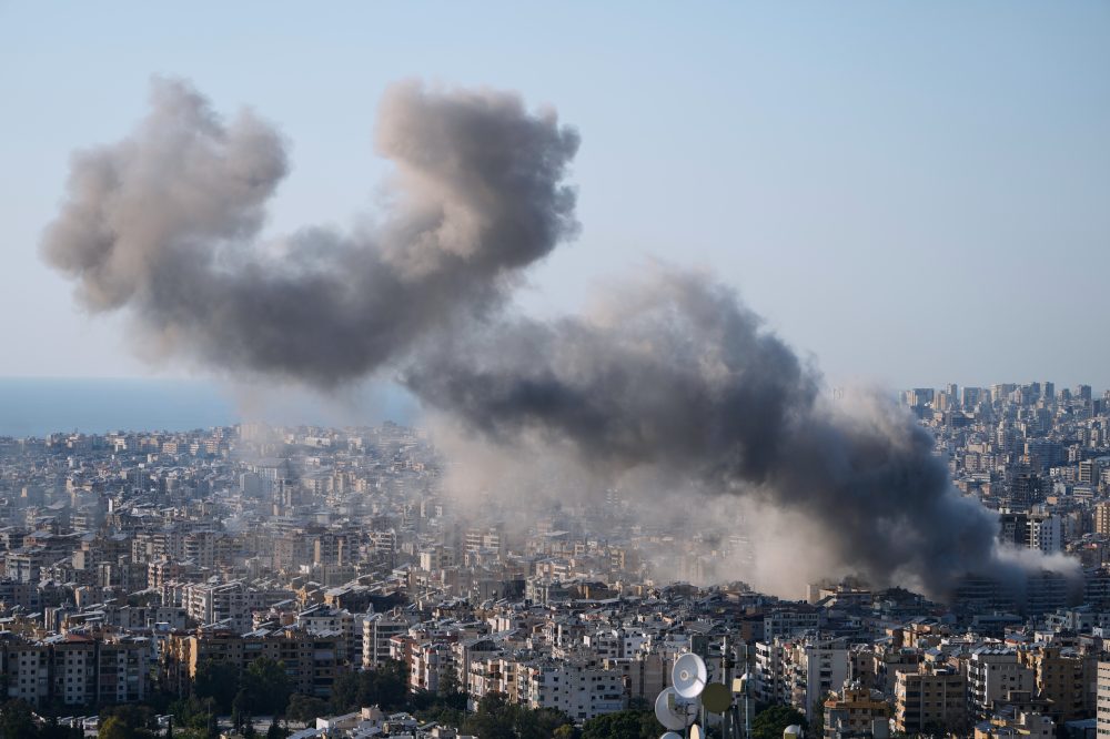 The Latest: Iran fires at Gulf states as Australia grants asylum to women on Iranian soccer team