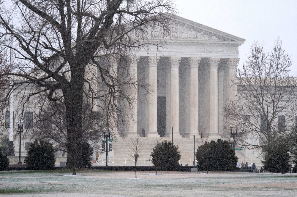 Supreme Court to hear arguments over push to end legal protections for migrants from Haiti, Syria