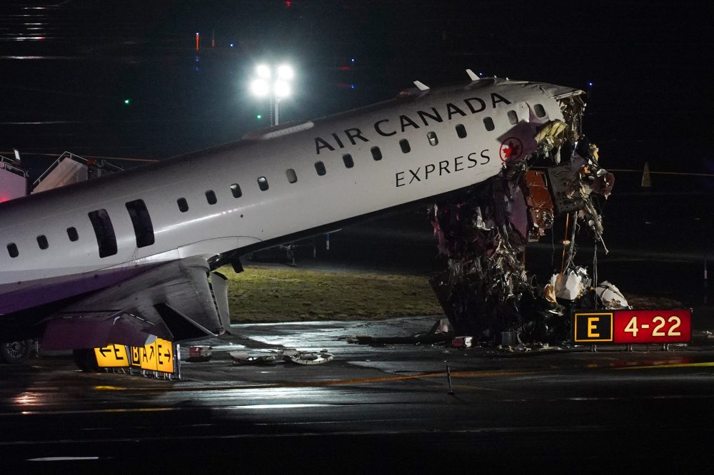 Photos show the scene of a collision on a runway at LaGuardia Airport in New York