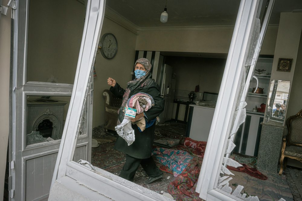 Attacks batter northwest Iran striking a residential building in first AP photos from outside Tehran