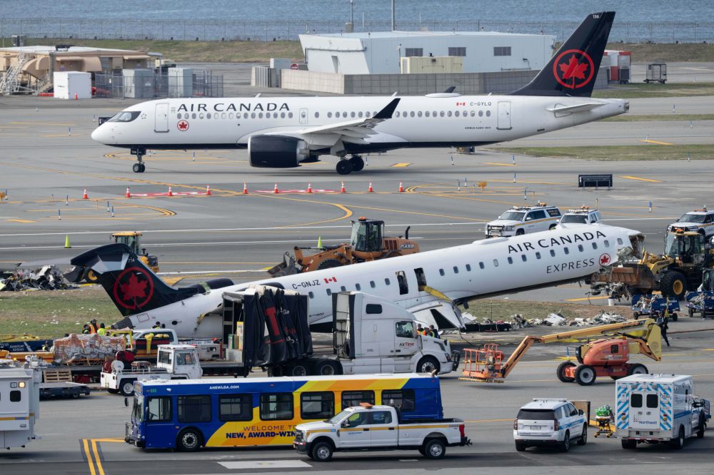 Mangled plane in LaGuardia crash is towed from runway as most injured passengers leave hospital
