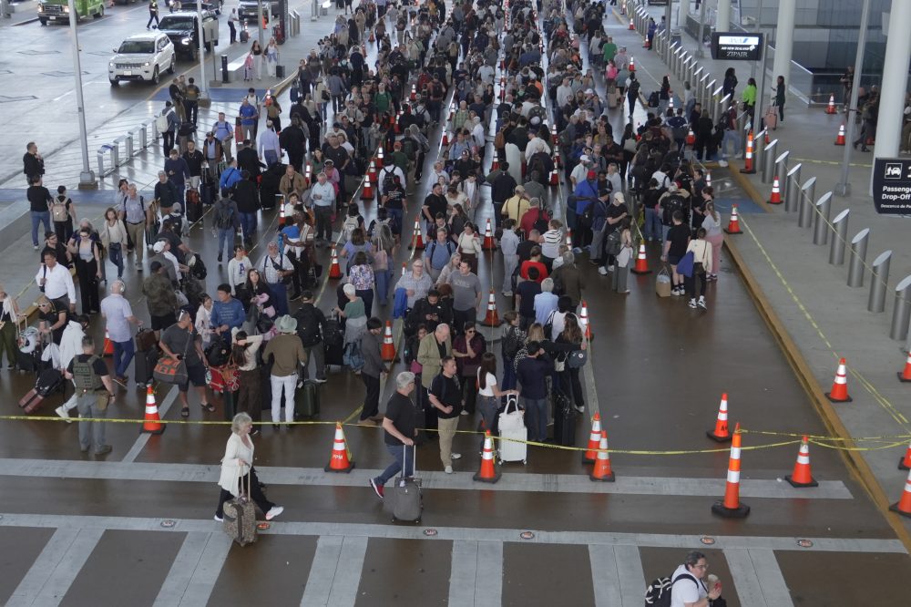The Latest: Almost 500 TSA officers have quit during the shutdown