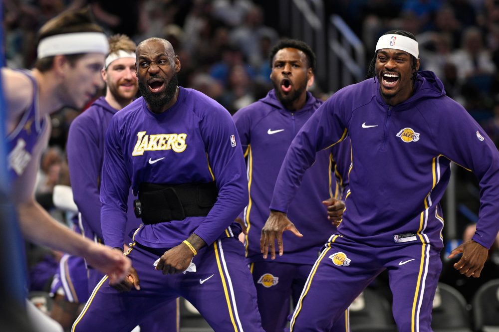 LeBron passes to Bronny for a 3-pointer and the NBA’s first father-son assist, league says