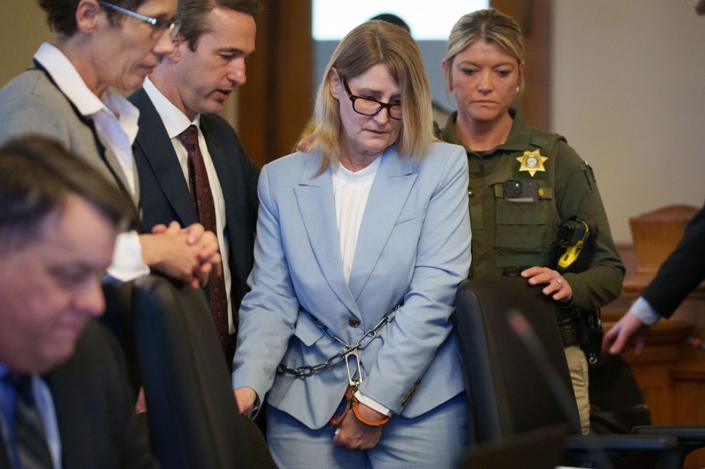 An Iowa woman pleads not guilty in the 2011 killing of real estate agent