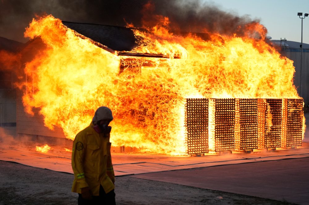 As the planet warms, scientists burn homes to figure out how to best protect them in wildfires
