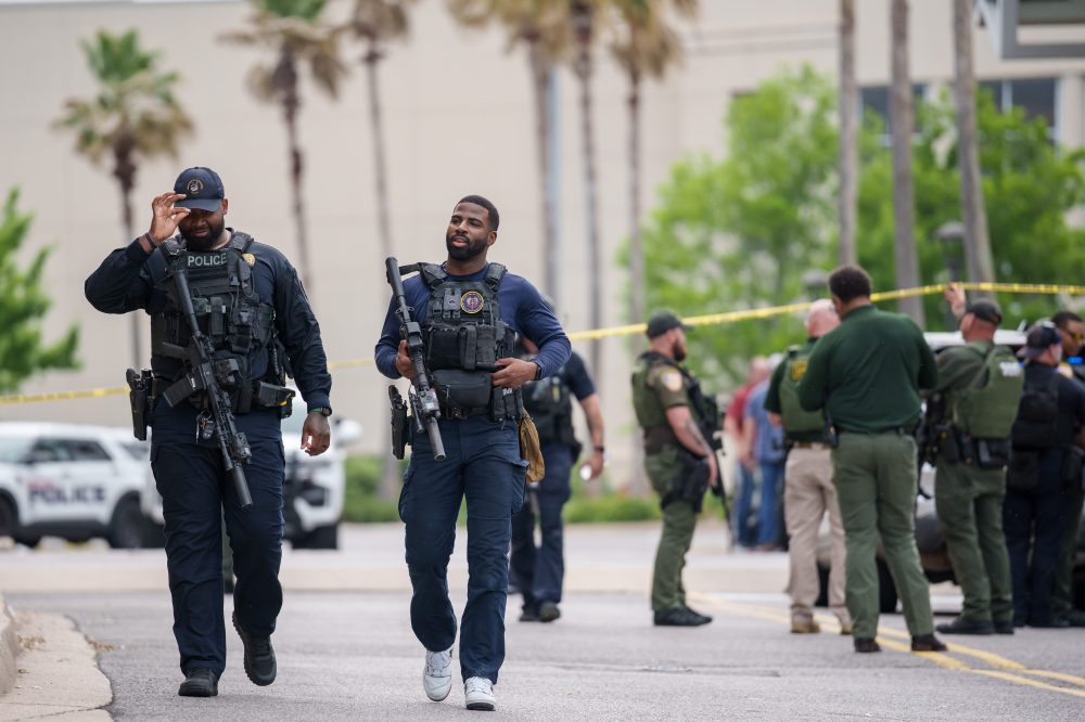 Authorities arrest one person and search for another, following deadly shooting at mall in Louisiana