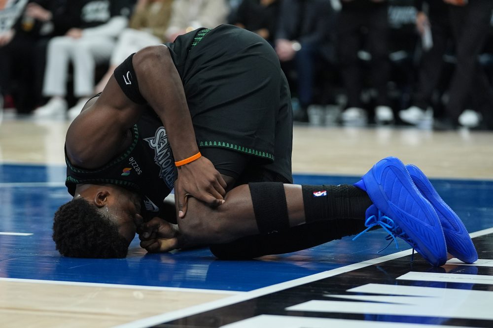 Wolves’ Anthony Edwards has bone bruise in left knee and is likely to miss weeks, AP source says
