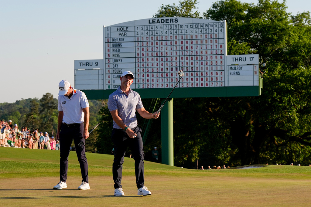 The Latest: Final round of the Masters heats up