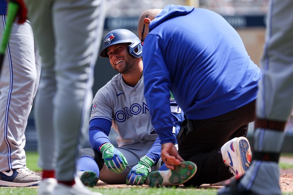George Springer leaves Blue Jays game after being hit by pitch on left foot, but X-rays are negative