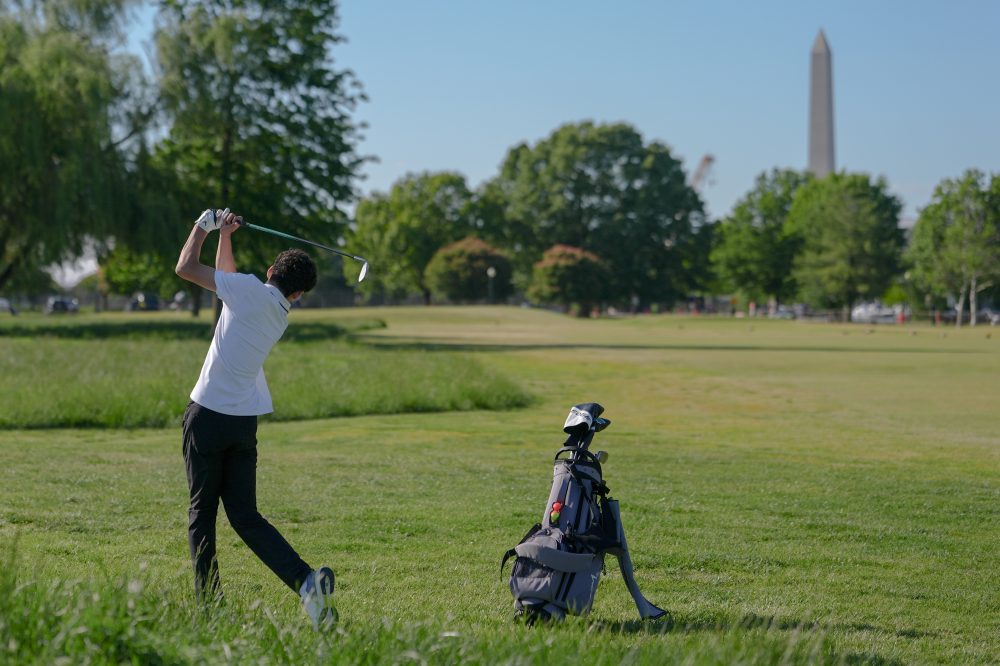 Judge in dispute over Washington golf course tells Trump officials not to cut trees without notice