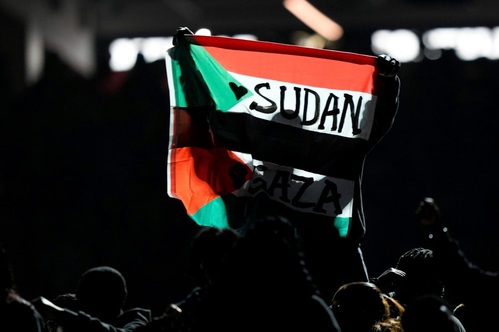 Super Bowl halftime performer who ran with protest flag found guilty of resisting an officer