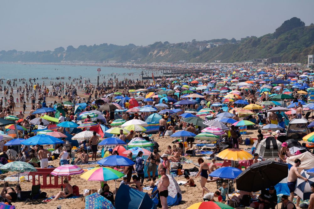 Parts of Europe swelter in record May heat as deaths at amateur sports events spur warnings