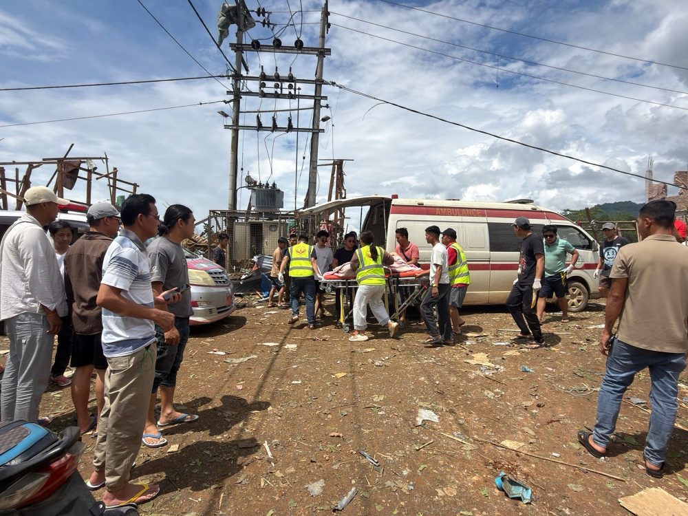 Rescuers dig for bodies after a mining explosives blast in Myanmar kills at least 43