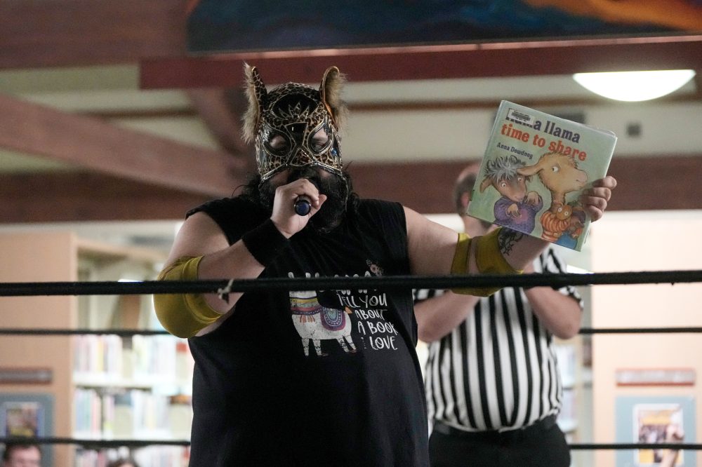 Wrestling matches provide an action-packed story time at US libraries, in photos
