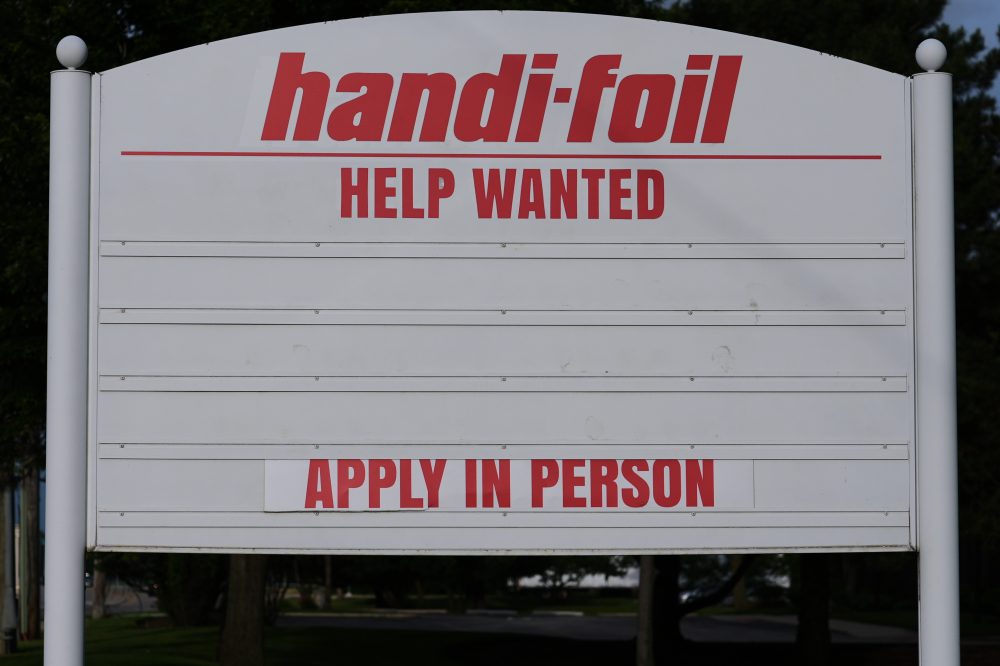 US jobless claims dip modestly to 215,000 last week as layoffs remain at historically healthy levels