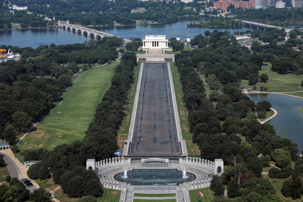 Drained Reflecting Pool reveals Trump’s ‘American flag blue’ liner is now closer to gray
