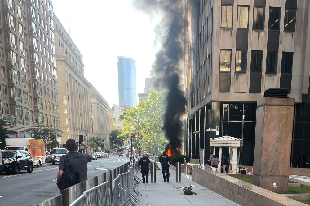 Person in custody after smoke and flames erupt outside New York federal building, FBI says