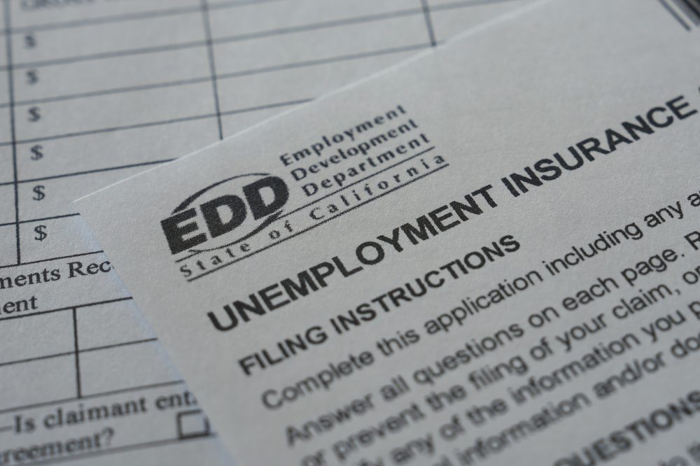 US filings for jobless benefits rise to 197,000 last week, but layoffs remain historically low