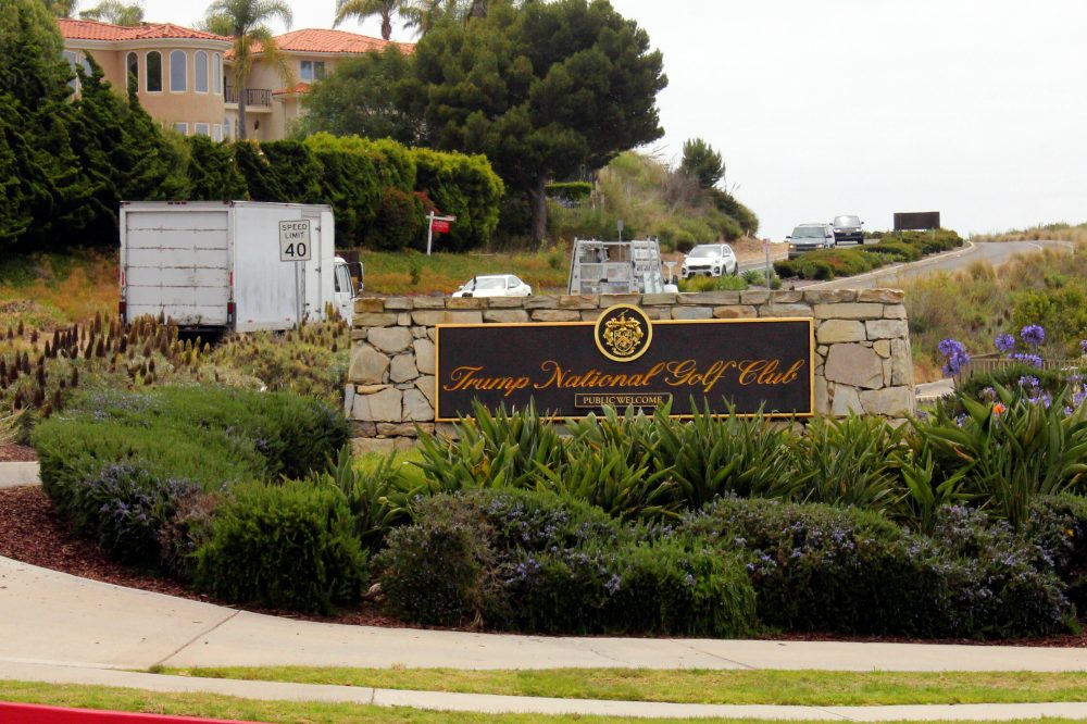 A judge suspends charges against an ex-Marine arrested on Trump’s golf course with ammunition