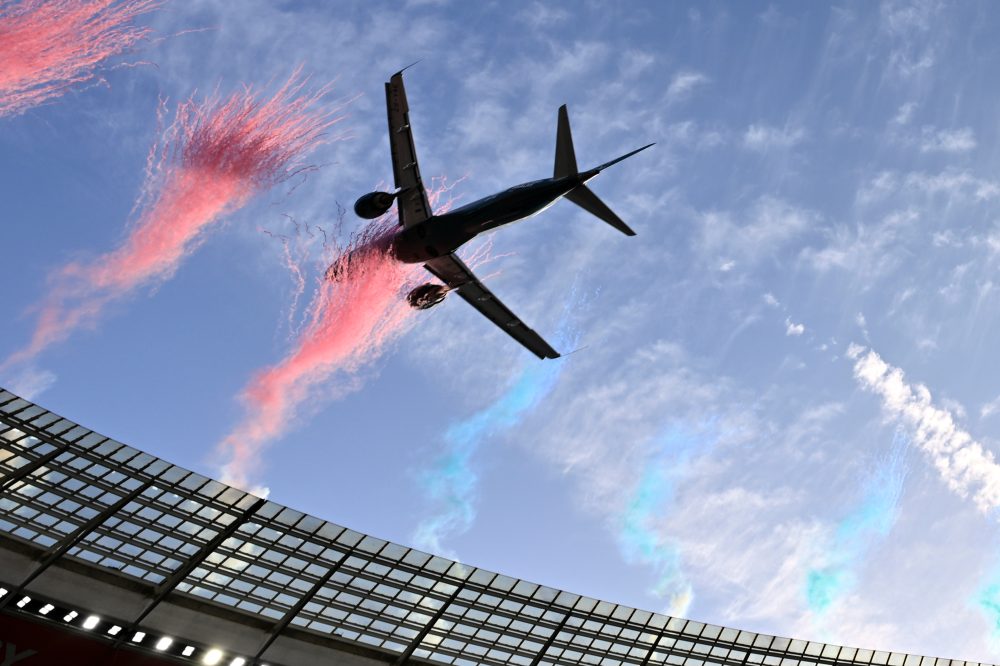 Dramatically low flyby by passenger jets over packed South African stadium sparks safety debate