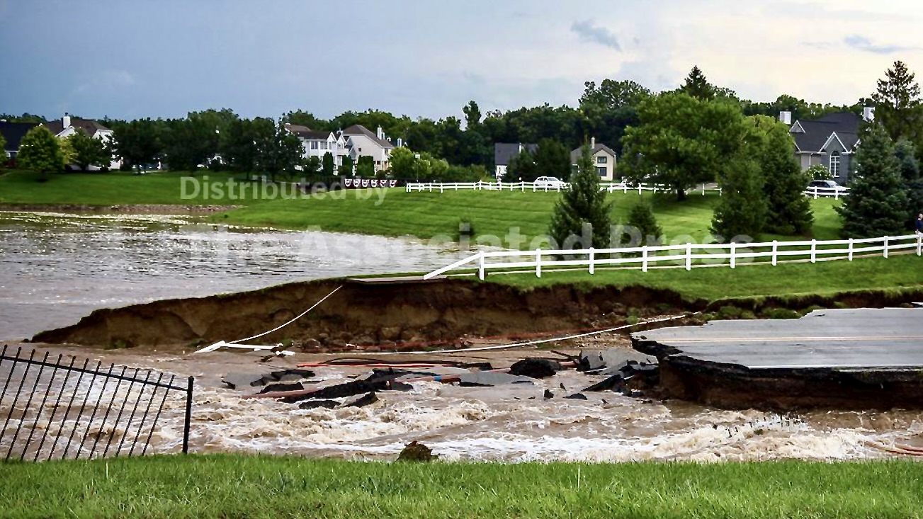 At least 6 people have died from days of storms and record-setting flooding in Indiana