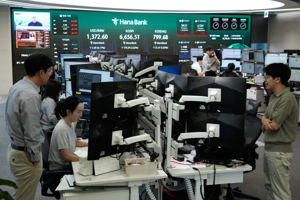 Asian shares decline after stocks slip on Wall Street, while global bond sell-off intensifies
