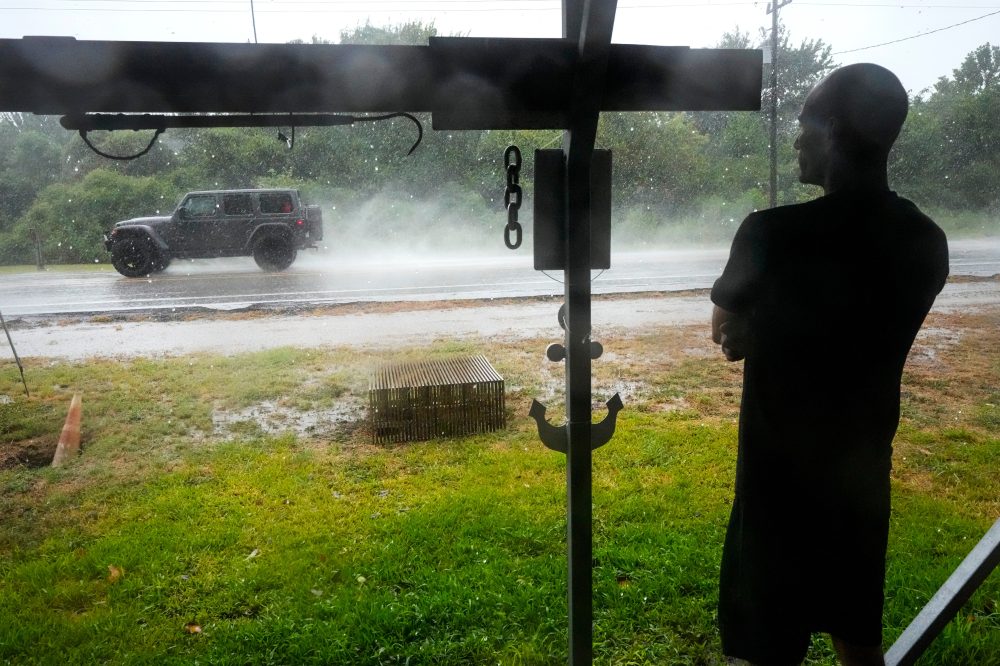 Edouard, now a tropical depression, drenches Texas with flash flooding and downed trees