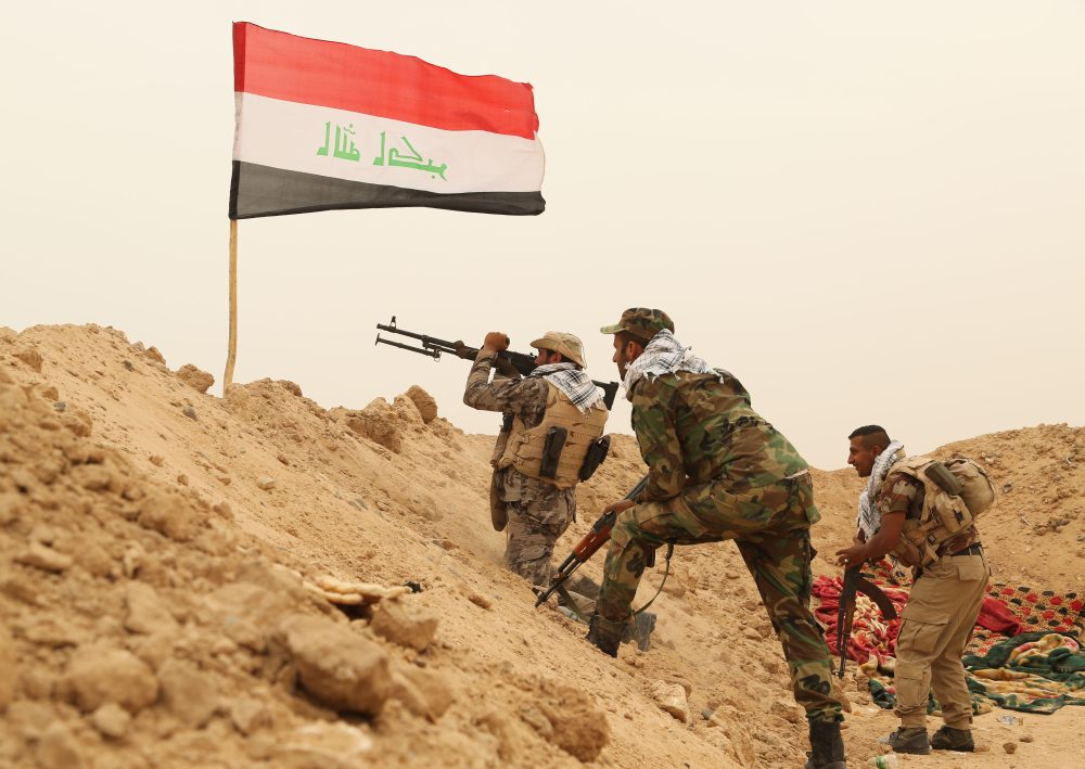 As the last US troops pack up in Iraq, militias signal their weapons will stay