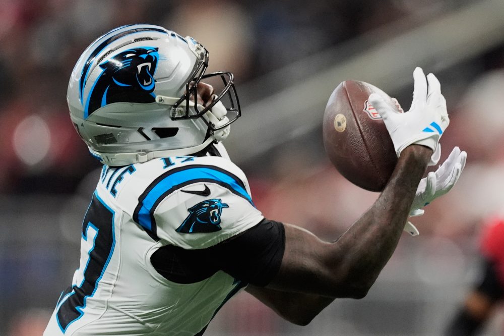 Young throws 3 TD passes, including 2 to Waller, as Panthers dominate short-handed Falcons 34-3