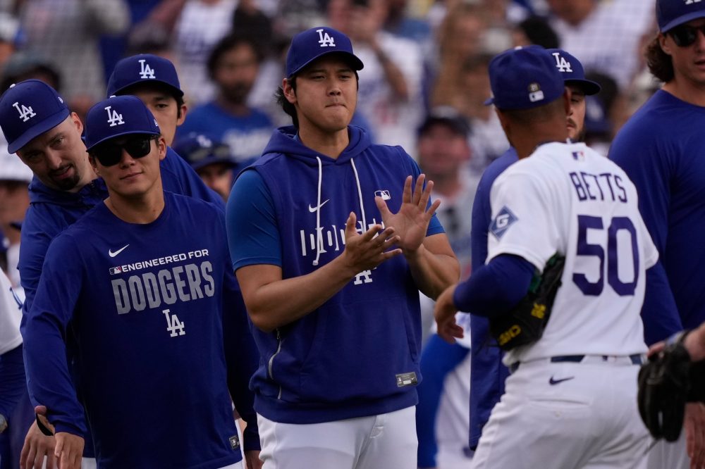 The latest on MLB postseason clinches, Ohtani and Judge health updates, awards races and more