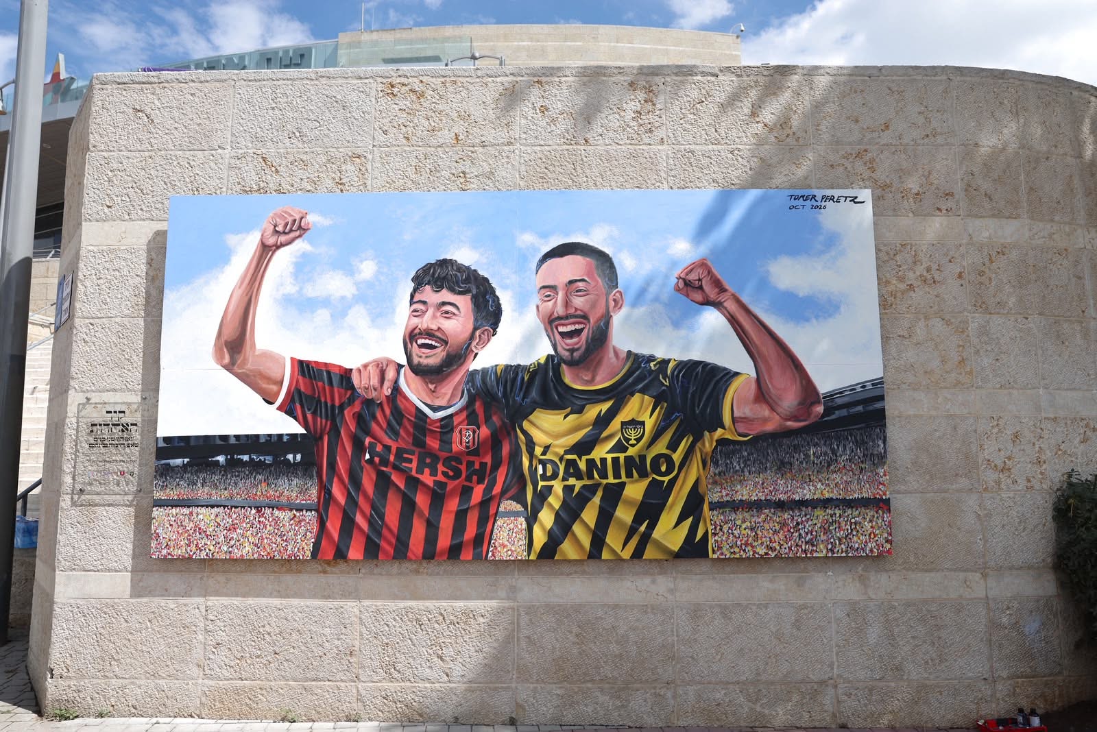 The Media Line: Jerusalem Unveils Teddy Stadium Mural Honoring Israeli Hostages Ori Danino, Hersh Goldberg-Polin  